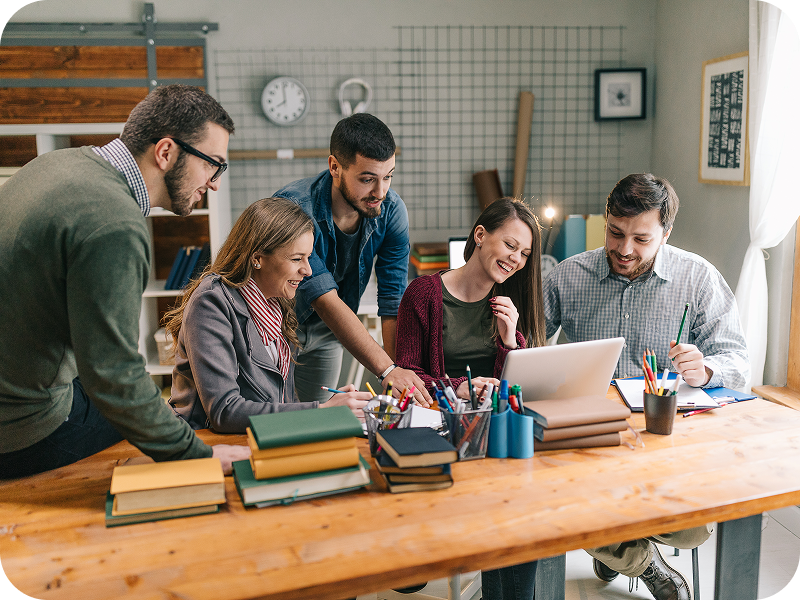 Colleagues brainstorming in office setting